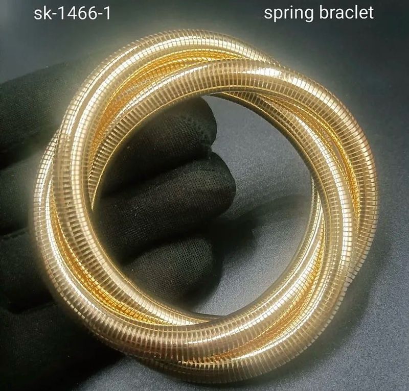woman’s gold bracelet