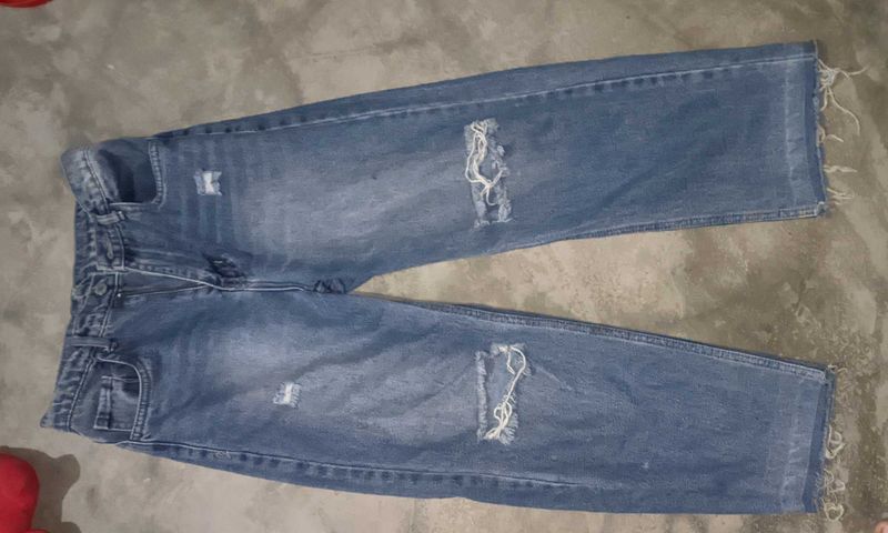 Ripped Blue Denim Jeans