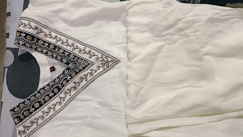 Elegant White Kurta with Embroidered Neckline