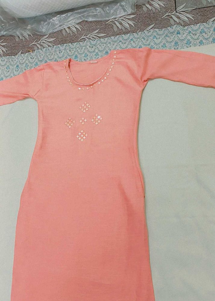 Elegant Peach Kurta with Embellishments