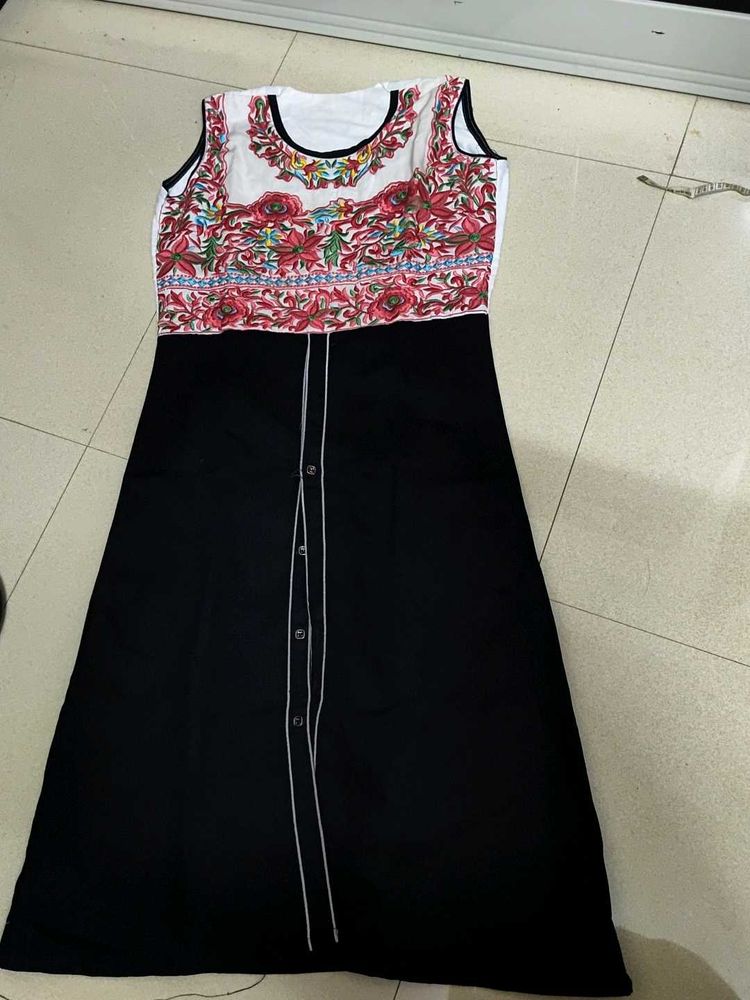 Embroidered Kurta...upperpart cotton lower Den