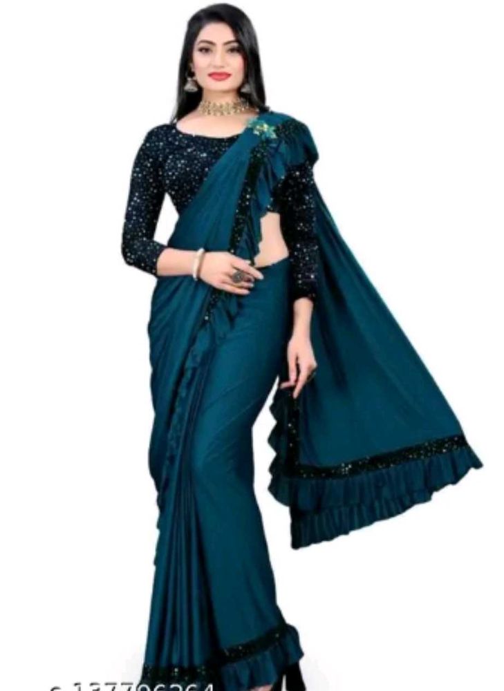 Stunning Teal Saree with Sequined Blouse
