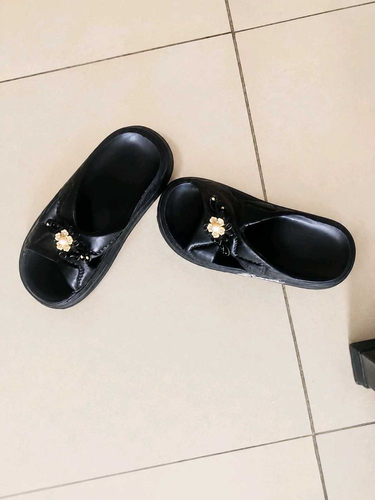Black Slides with Flower Embellishment