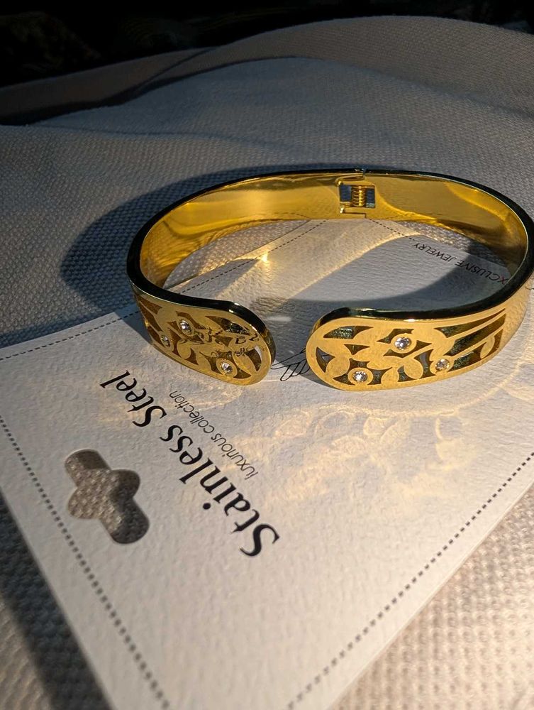 Elegant Gold Tone Bangle Bracelet