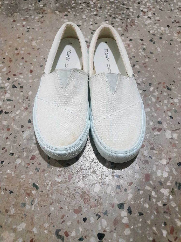 Classic White TOMS Slip-On Shoes