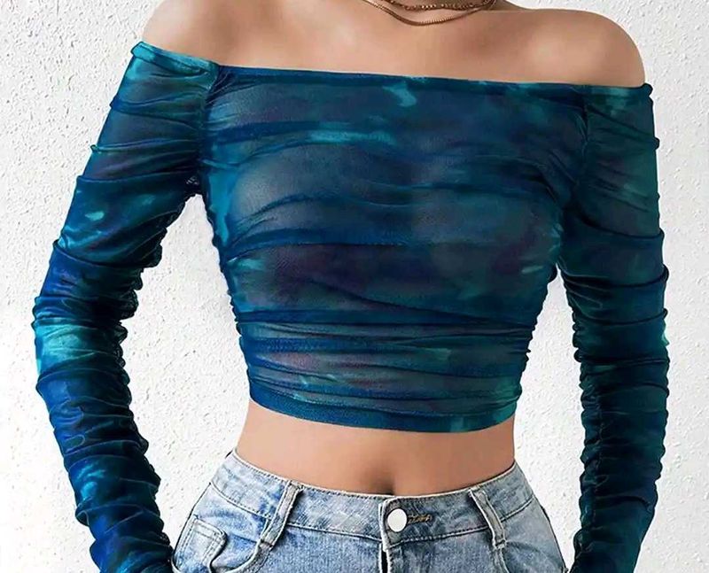 A blue off shoulder crop top