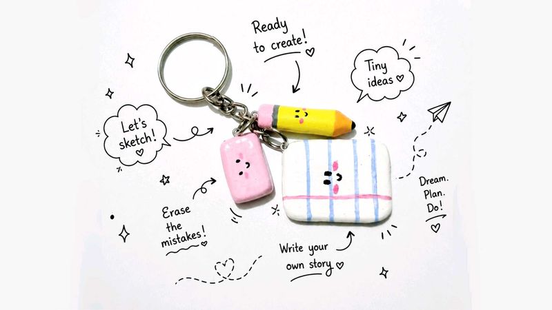 A tiny notebook, pencil and eraser Key chain 📚✏️