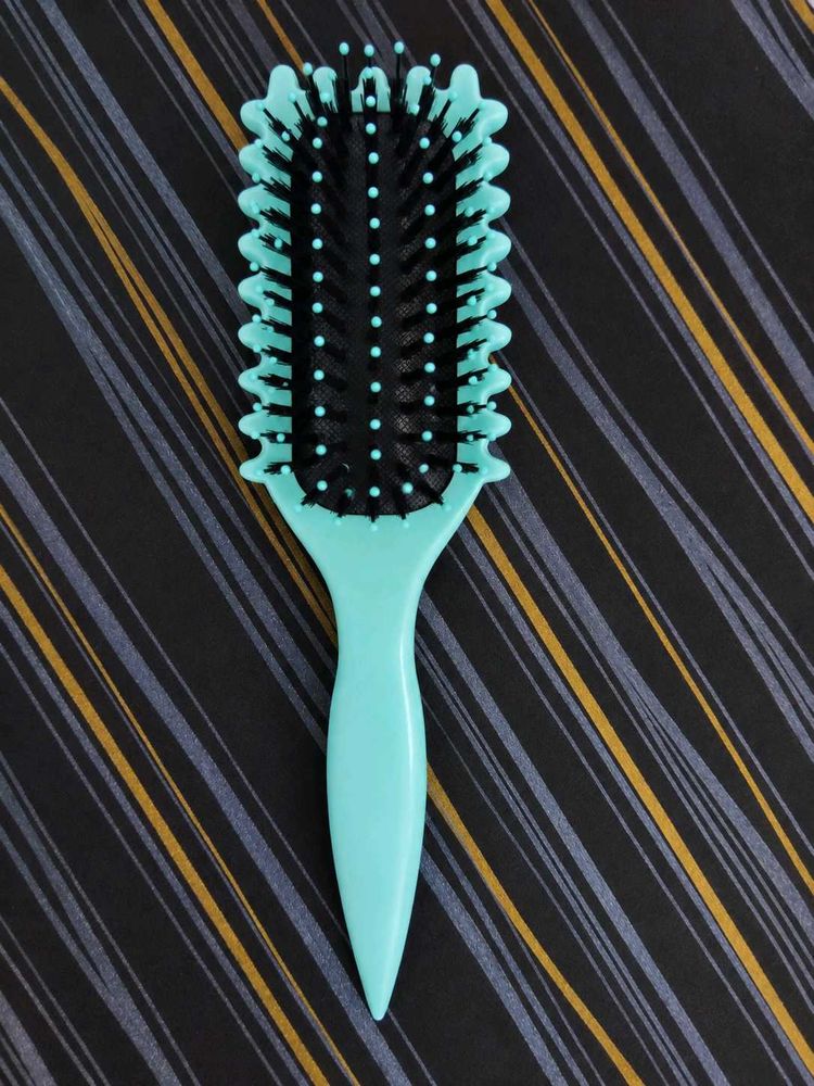 blueish aqua Paddle Hair Brush.