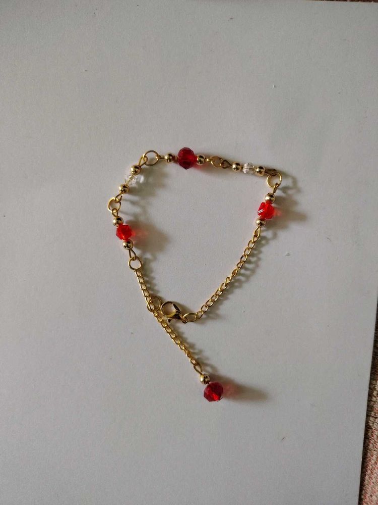 Elegant Gold Chain Bracelet with Red Beads