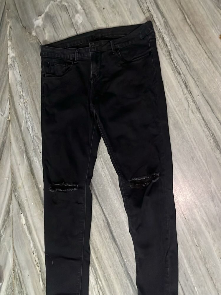 black distressed jeans