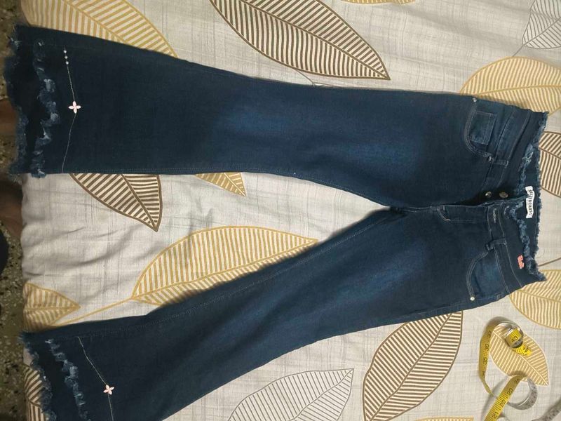 Blue Denim Flare Jeans with Frayed Hem