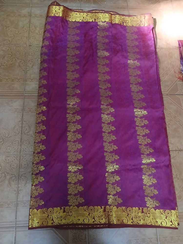 Vibrant Purple Saree with Gold Border