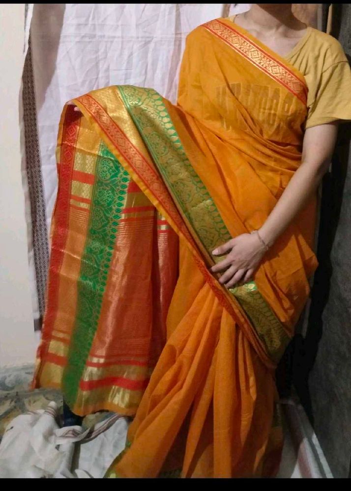 Vibrant Orange Saree with Green Border