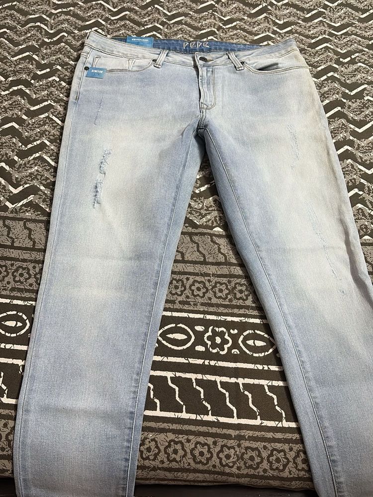 Light Wash Distressed Jeans