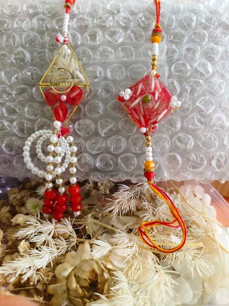 Handmade resin couple rakhi