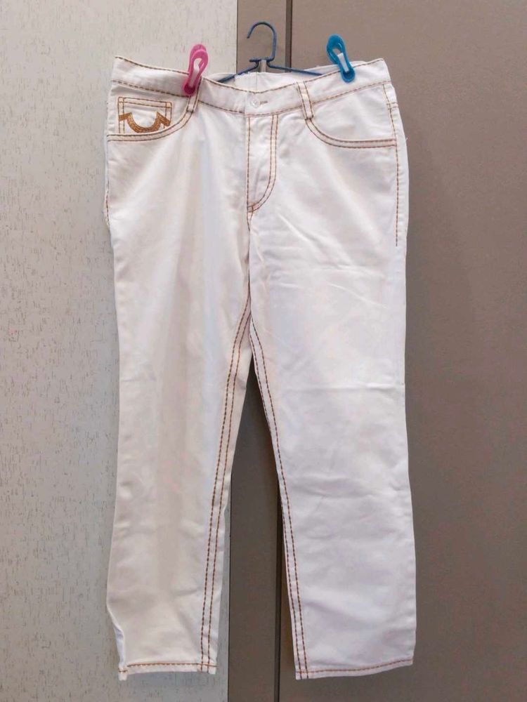 Stylish White Jeans with Brown Stitching