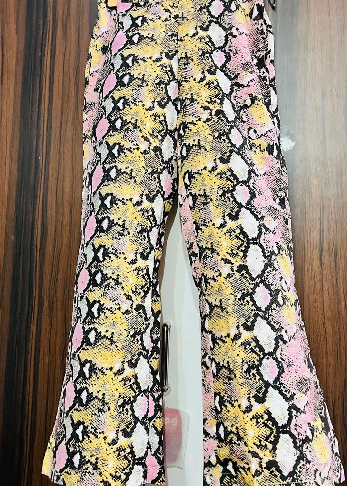 Trendy Snake Print Flare Pants