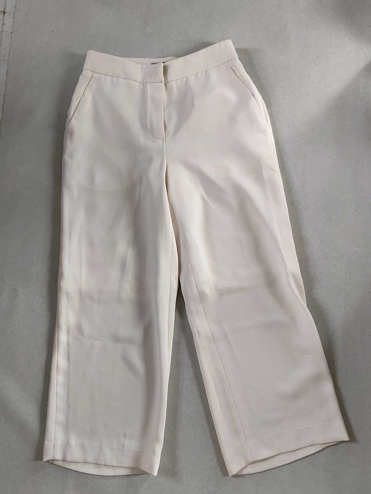 Light beige trousers