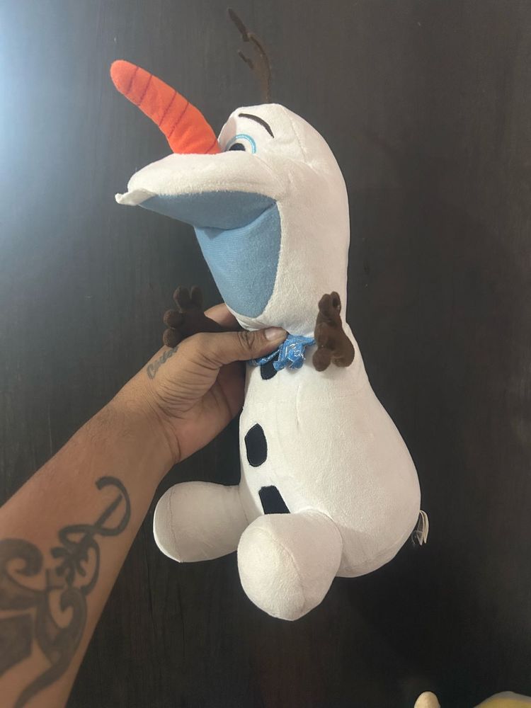 an official Olaf Plush from Disney's Froz