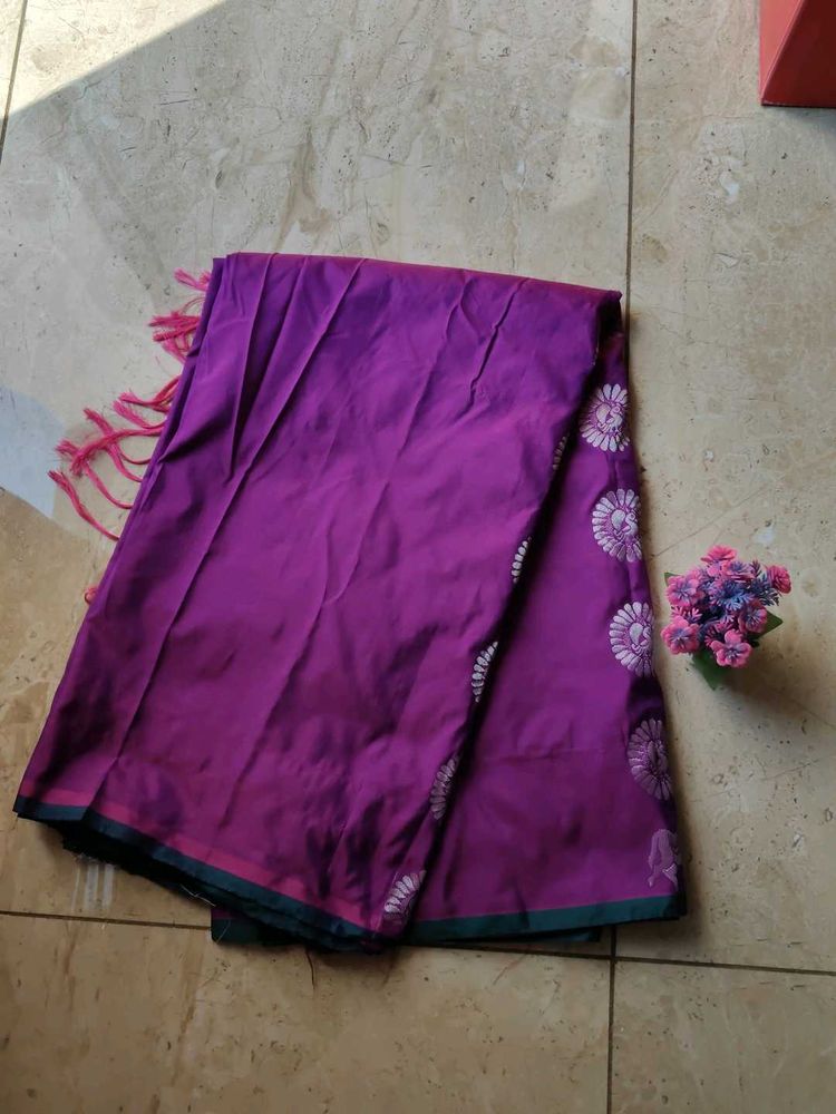 Elegant Purple Saree with Floral Accents