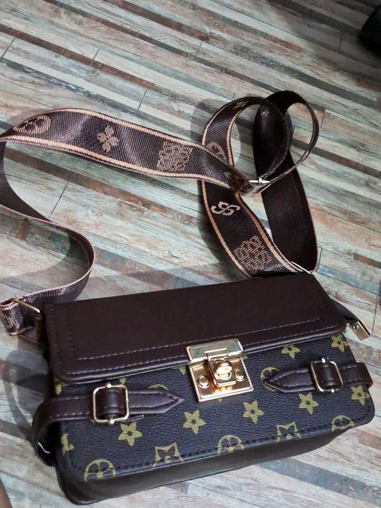 Stylish Brown Crossbody Bag with Monogram Strap