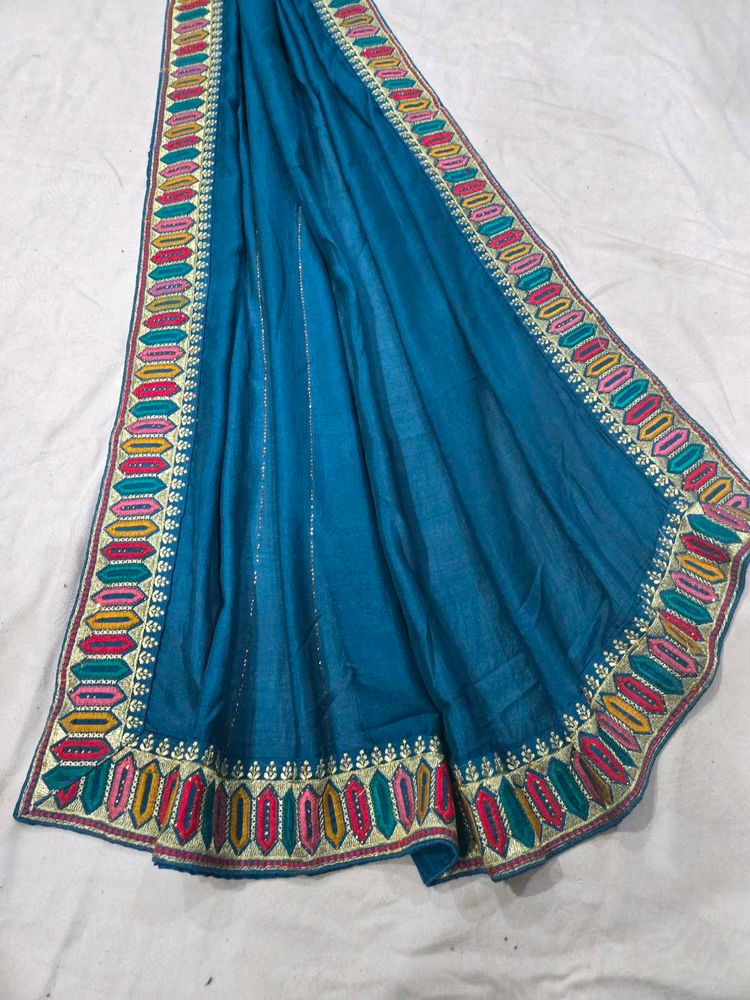 Embroidered Teal Blue saree