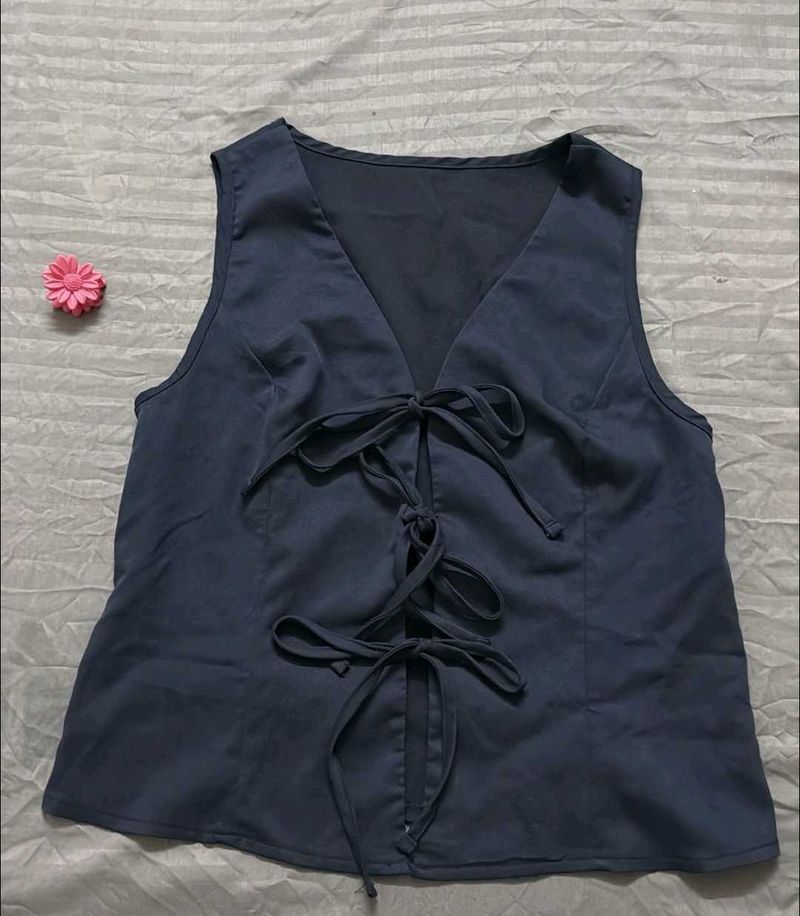 Sleeveless V-Neck Tie-Up Top from savana
