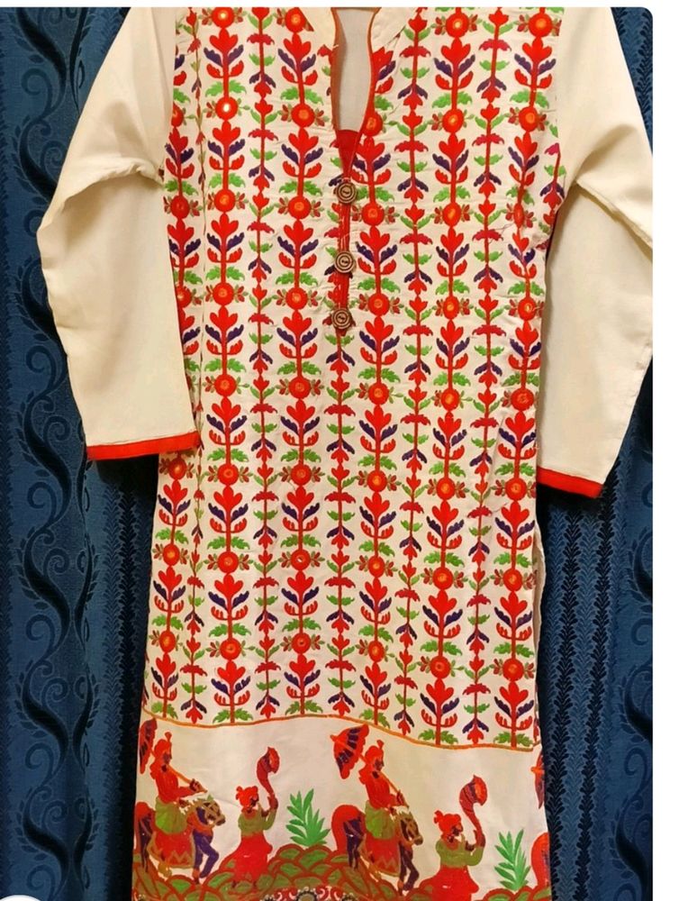 Women white Embroidered Kurty.