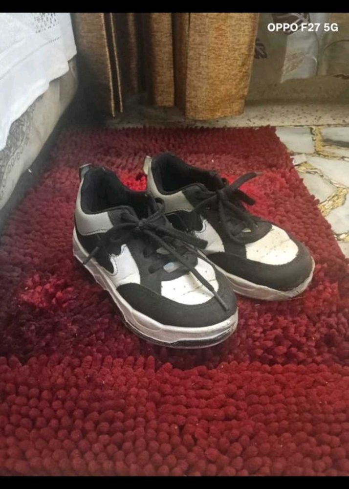 5. Stylish Black &amp; White Sneakers