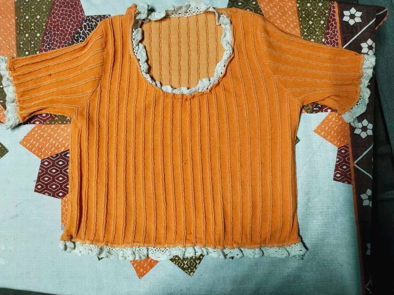 This top has a charming, cottagecore-inspired vibe
