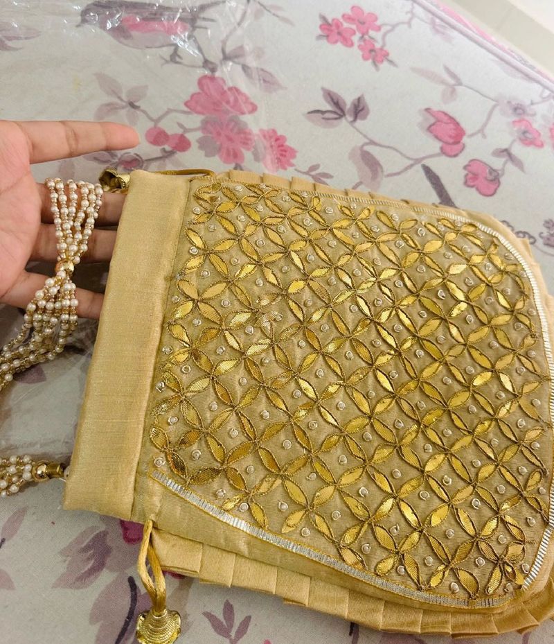 Elegant Gold Embroidered Clutch
