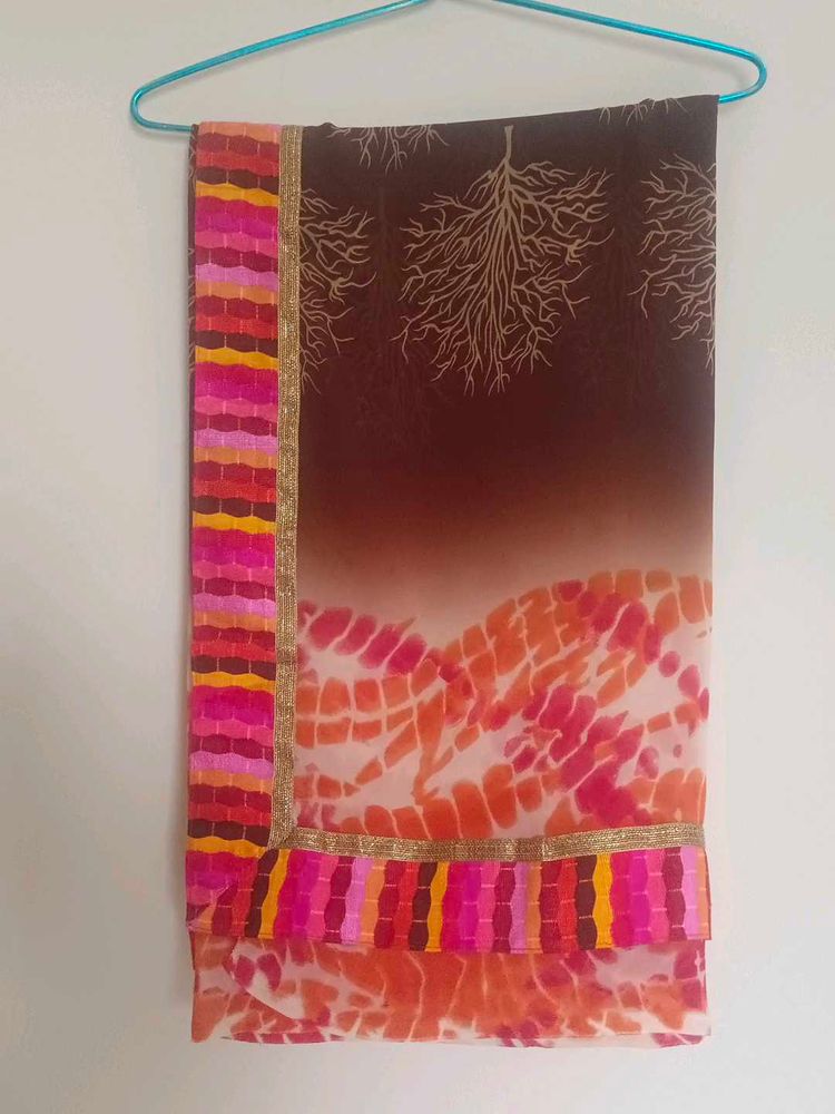 Vibrant Tie-Dye Print saree with stitched blouse