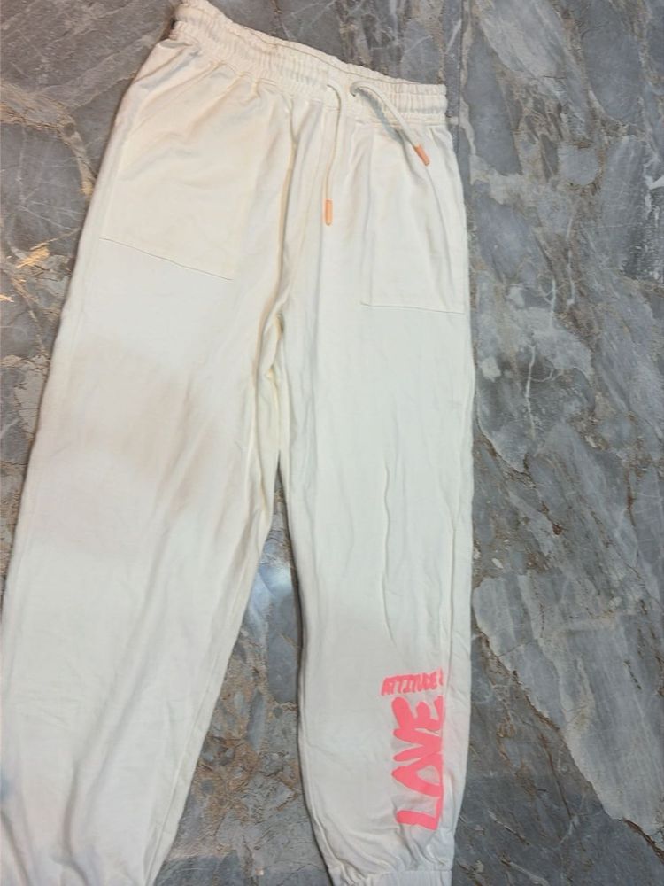 Cream Jogger Pants with 'Love' Graphic
