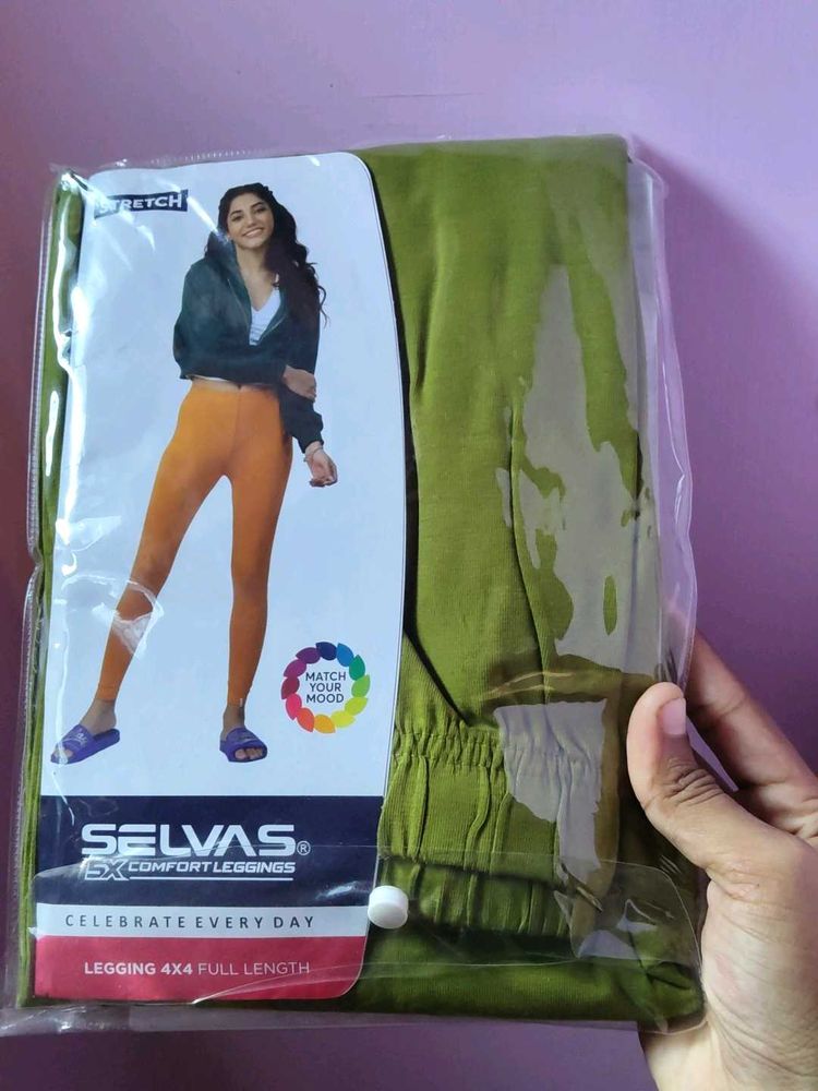 Green leggings
