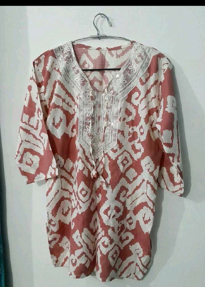 Stylish Printed Kurta with Embellished Neckline