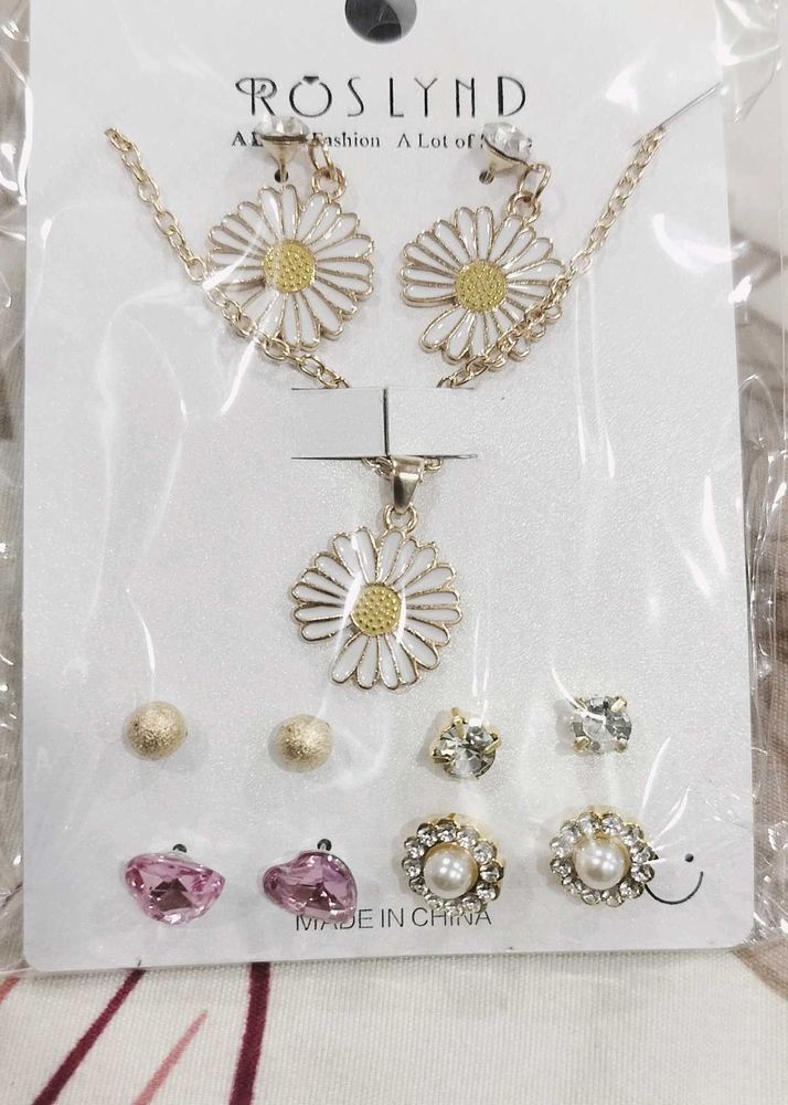 white floral pendant set with 4 pairs of studs