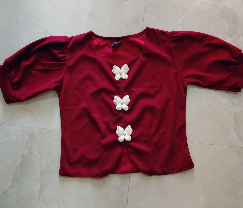 brand new Maroon Top with Butterfly Embellishments