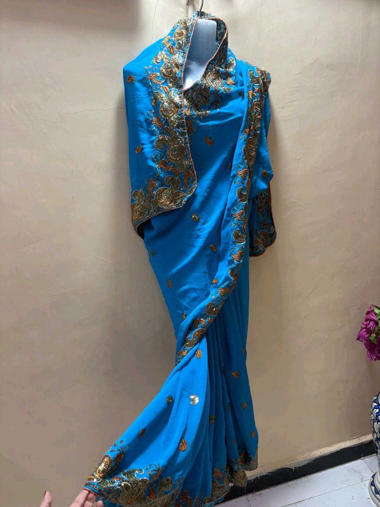 Vibrant Blue Embroidered Saree