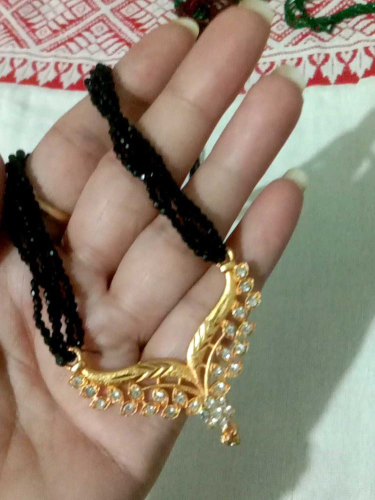 Elegant Black Beaded Mangalsutra with gold Pendant