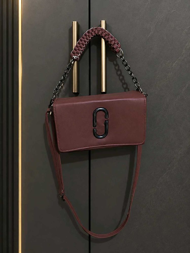 brown sling bag