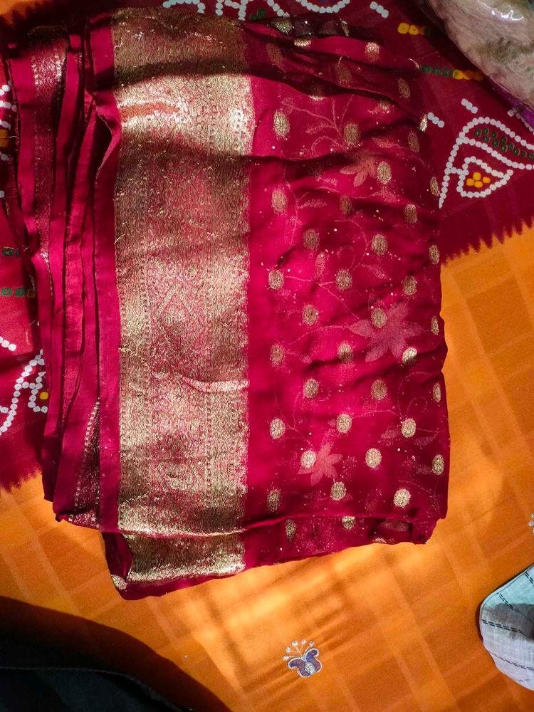 Elegant Red Saree with Gold Embellishments