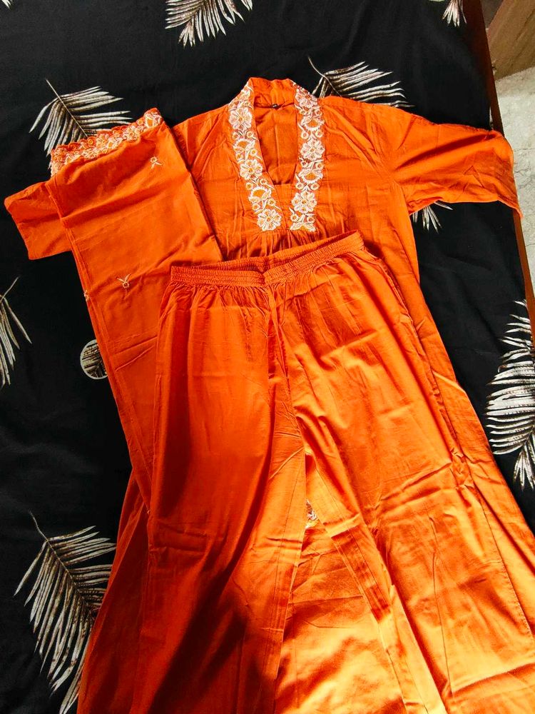 Vibrant Orange Kurta Set with White Embroidery