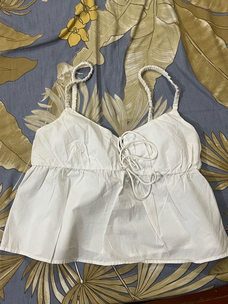 White peplum top