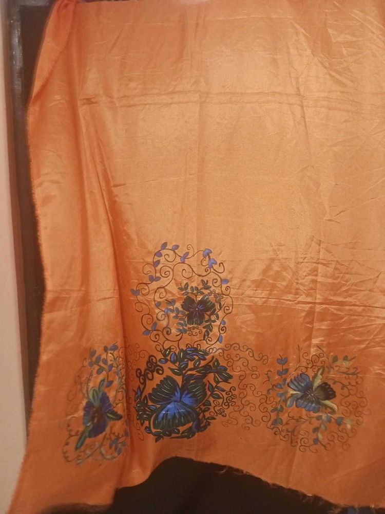 Orange colour dress material with Floral Border