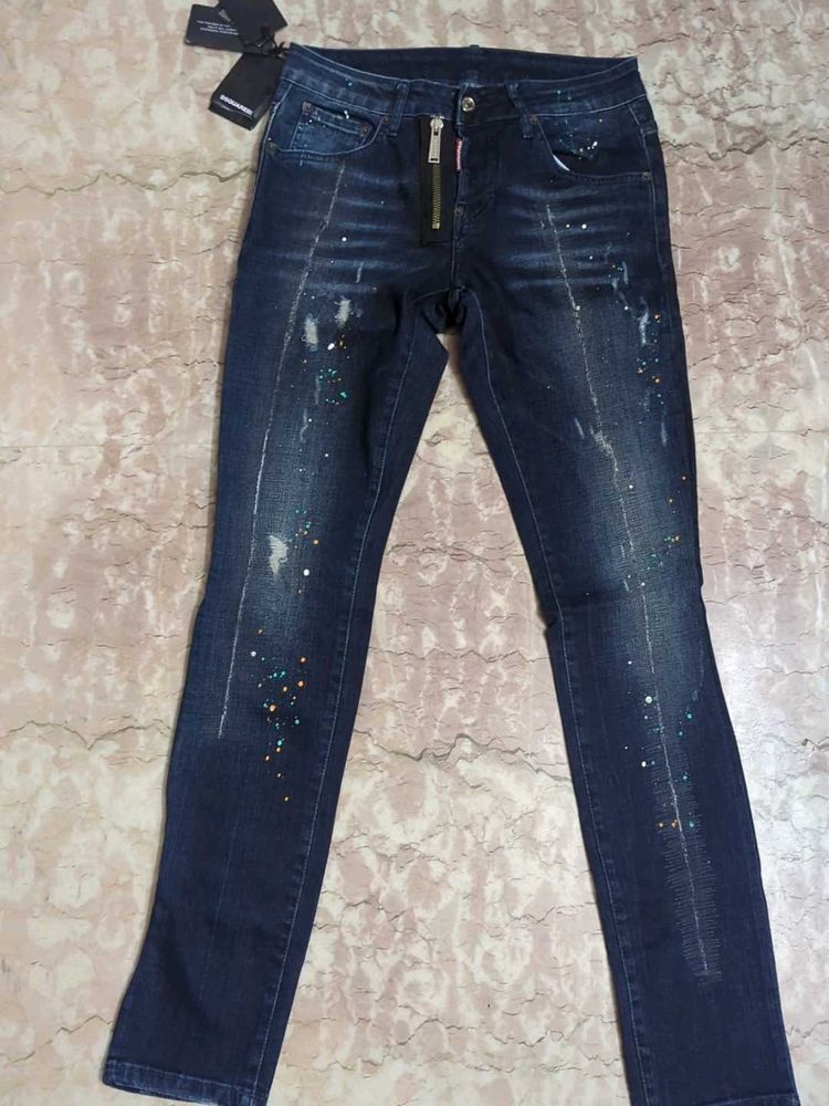 Stylish Dark Wash Jeans with Unique Embellishments