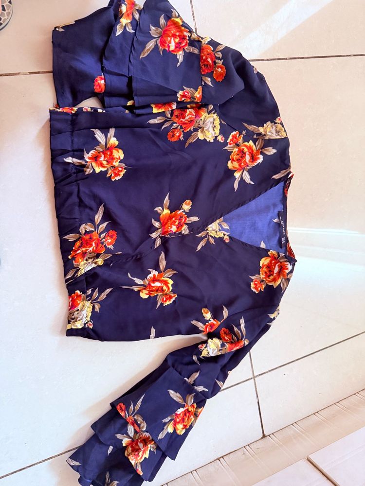 Navy Floral Wrap Top with Ruffled Sleeves