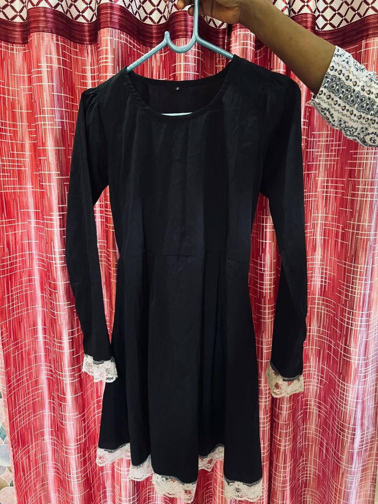 Elegant Black Lace Trimmed Gown