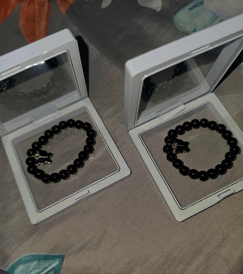 Set of Black Beaded Bracelets with Charms