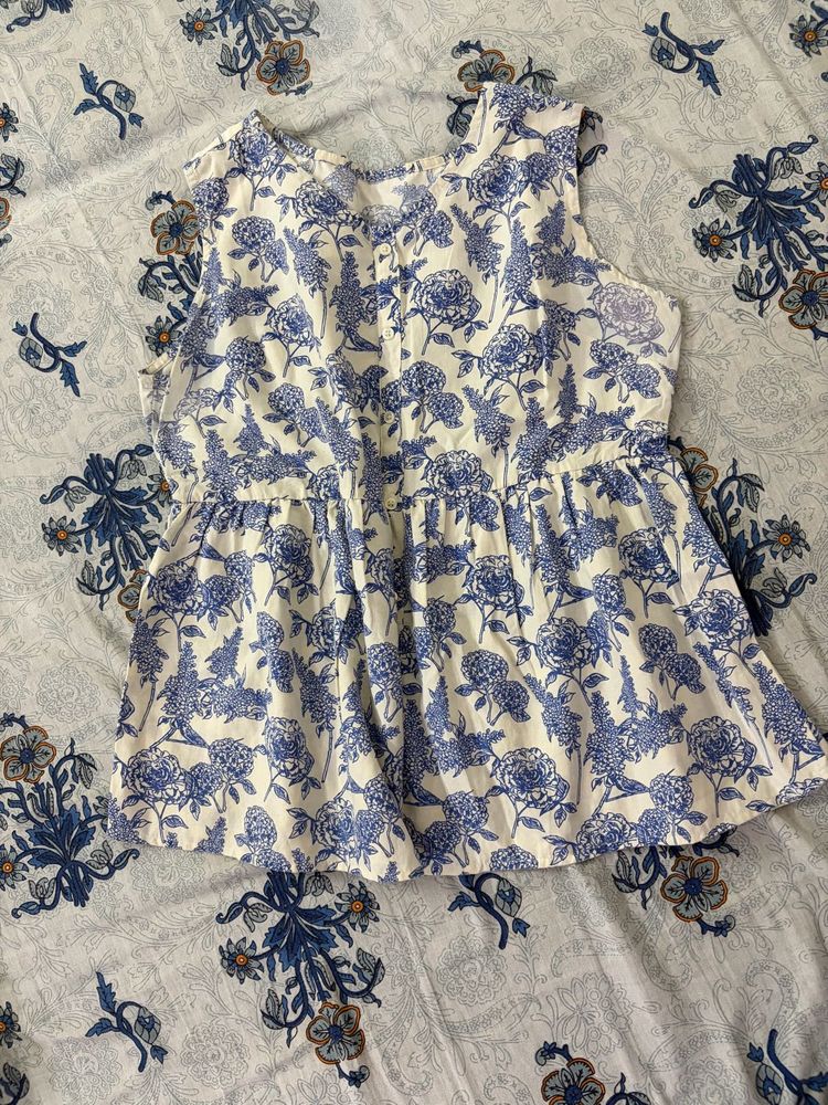 Blue Sleeveless Peplum Top