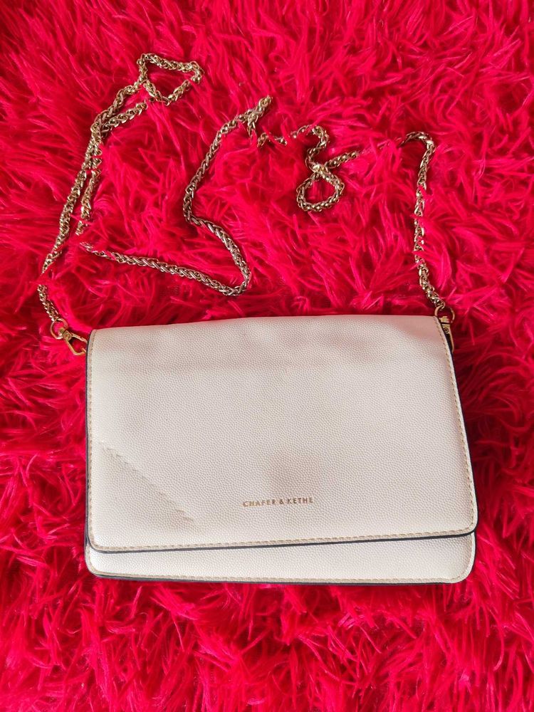Chic Cream Crossbody Bag with Gold Chain